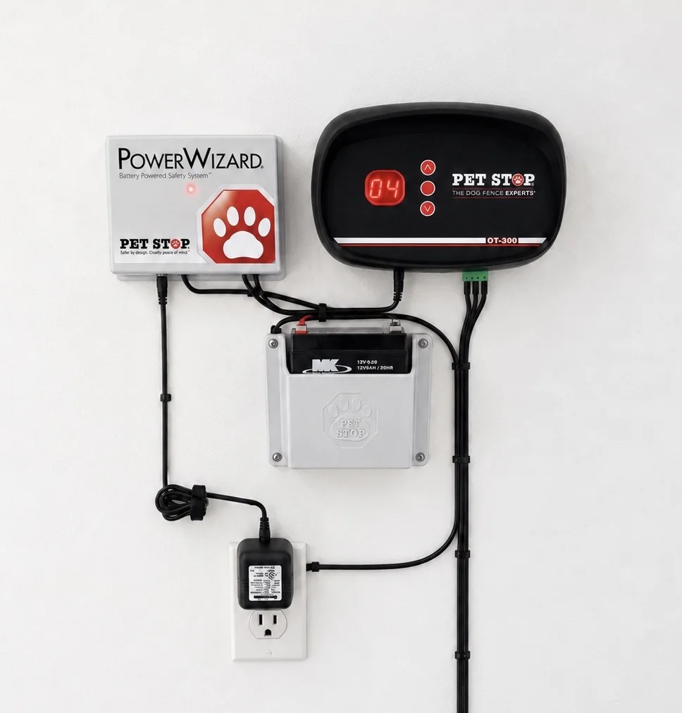 OT-300 transmitter mounted on a wall with the optional battery backup