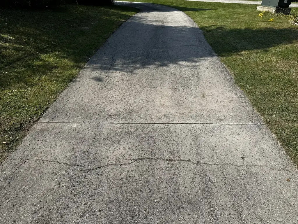 Clean driveway crossing with sealed channel